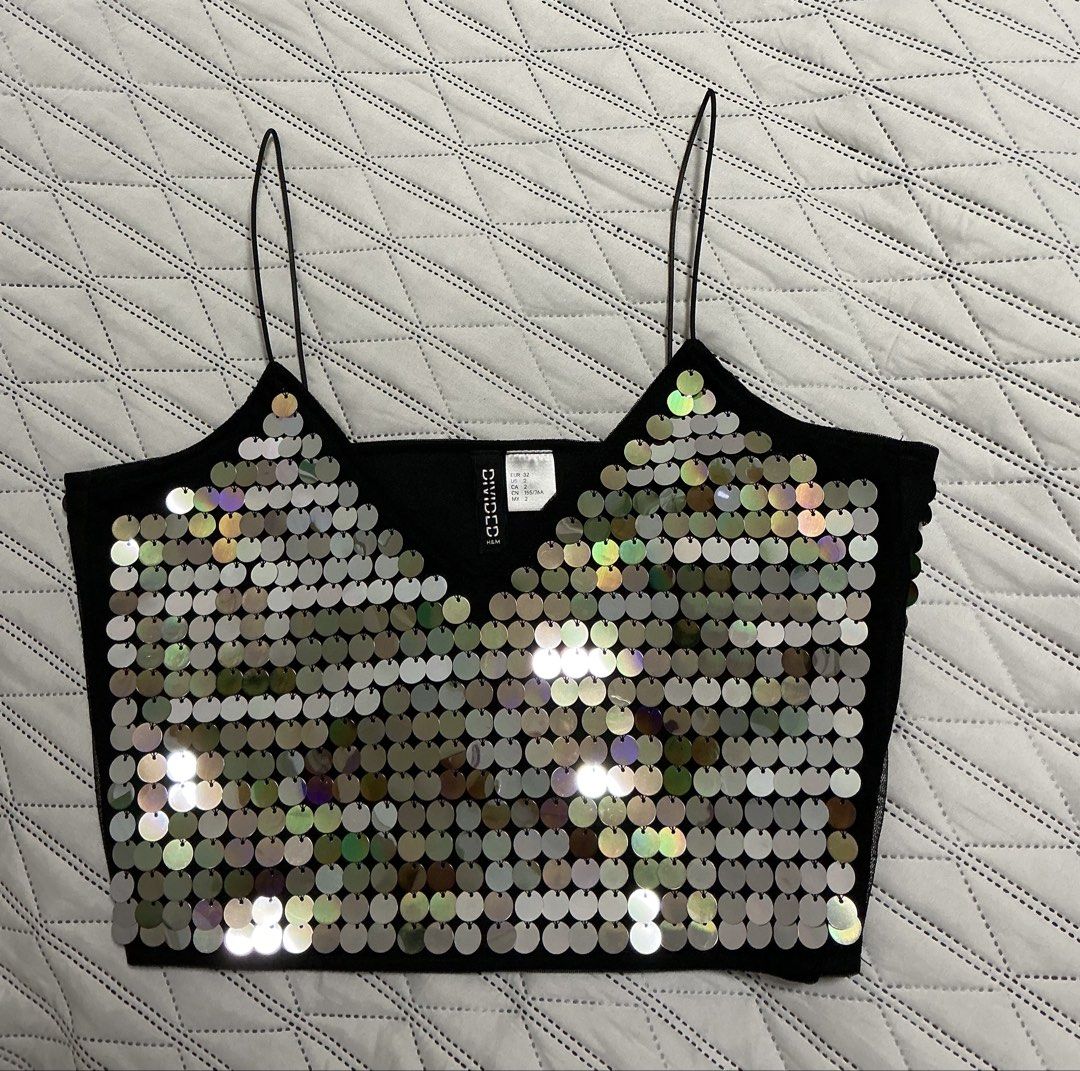 H&M Sequined Bustier (Category: Others Tops) located in Makati City. Submitted by boldturtle-8720 (Listing ID 1465135129, Image 3). Description: BNWT Sparkly H&M black cami top covered in eye-catching iridescent round sequins. L 15” Chest 14” Waist 13”.