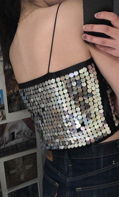 H&M Sequined Bustier (Category: Others Tops) located in Makati City. Submitted by boldturtle-8720 (Listing ID 1465135129, Image 2). Description: BNWT Sparkly H&M black cami top covered in eye-catching iridescent round sequins. L 15” Chest 14” Waist 13”.