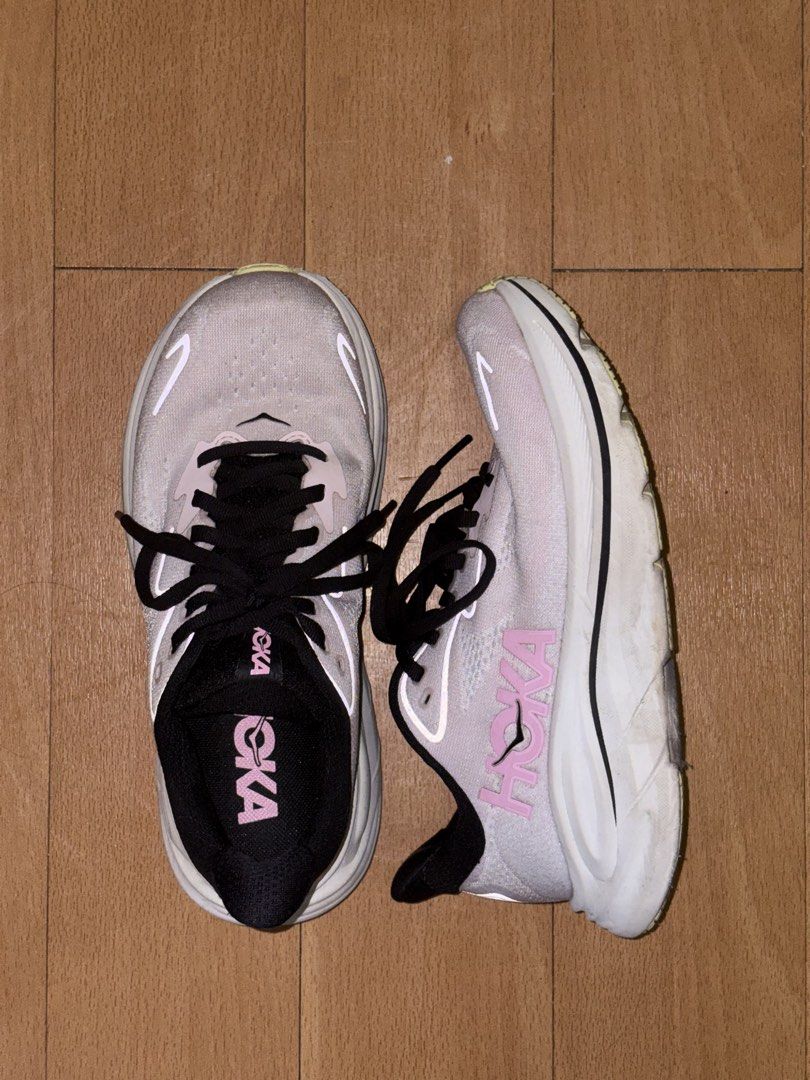 hoka clifton 10 (Category: Sneakers) located in Batangas. Submitted by miuparfait (Listing ID 1464989789, Image 2). Description: THE DETAILS: Highlights: • light pink • front lace-up fastening • chunky rubber sole • logo print to the side • branded insole Composition: Outer: Fabric 100% Sole: Rubber 100% Lining: Polyethylene vinyl acetate (PEVA) 100%, Fabric 100% Notes: • bought this for ₱7,000+ • used this mostly for walking + daily trainers for