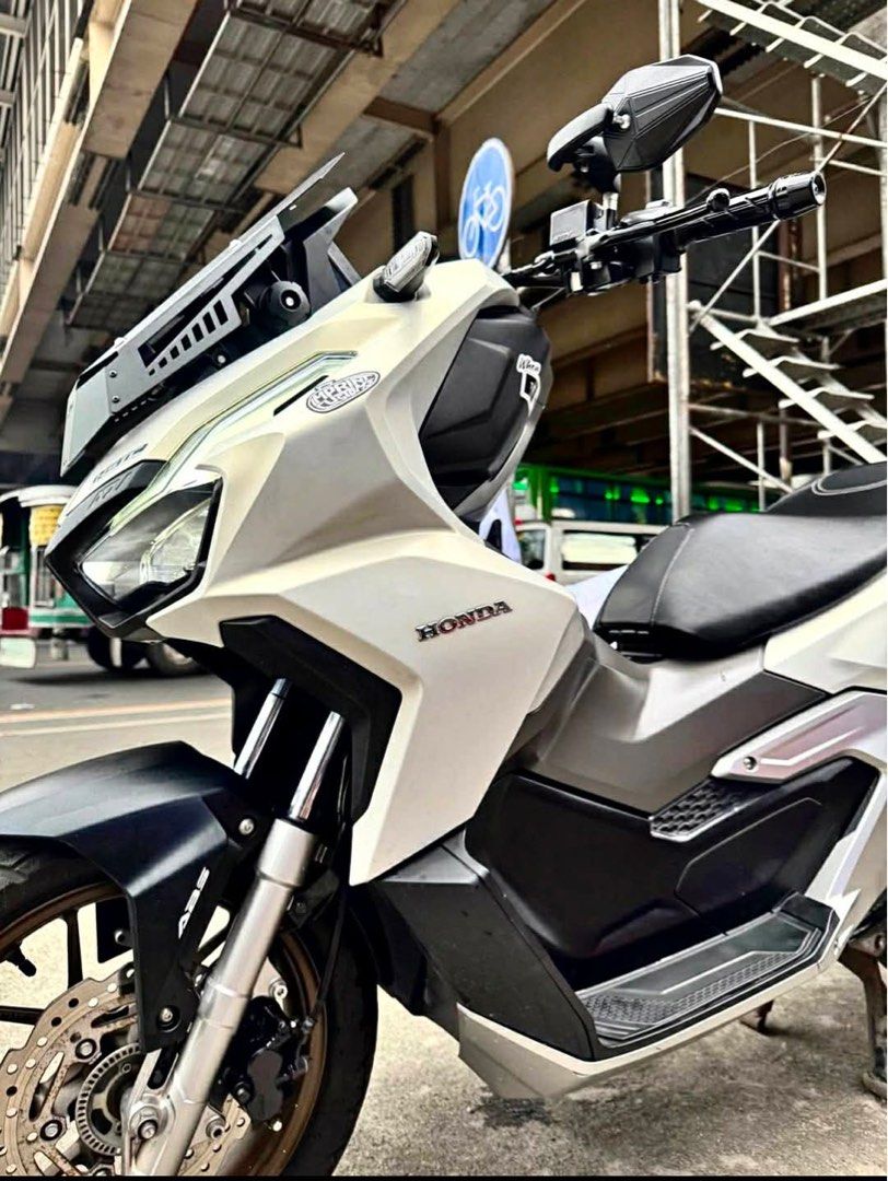Honda ADV160 (Category: Motorbikes for Sale) located in Manila. Submitted by tianatokyo (Listing ID 1464413449, Image 2). Description: For sale adv160 2024 model 7k odo 1st owner Complete original papers Allstock engine Good running condition Tahimik makina registered until Feb 2027 With original LTO plate upgrade piahorn mdl xenlo new tires new change oil powder coating mags alaga gas n g.