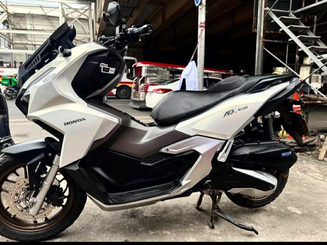 Honda ADV160 (Category: Motorbikes for Sale) located in Manila. Submitted by tianatokyo (Listing ID 1464413449, Image 1). Description: For sale adv160 2024 model 7k odo 1st owner Complete original papers Allstock engine Good running condition Tahimik makina registered until Feb 2027 With original LTO plate upgrade piahorn mdl xenlo new tires new change oil powder coating mags alaga gas n g.