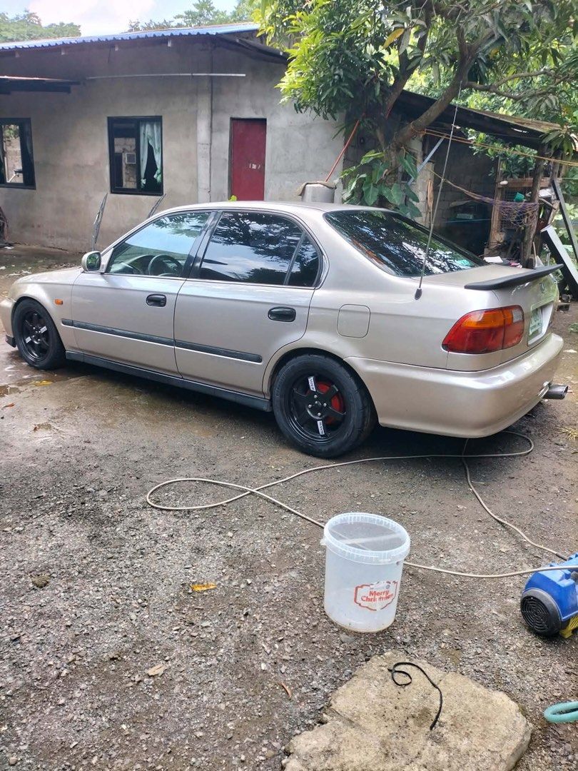 Honda Civic 1.6 VTI (A) (Category: Used Cars) located in Makati City. Submitted by warm.abc123 (Listing ID 1459695877, Image 3). Description: 2000 Honda Civic SIR BODY Loc: San Antonio, Quezon province (near Lipa Batangas) Automatic transmission (no delay) All stock P6FD6 VTEC engine all stock Good running condition Okay pa paint wag lang sobra selan sidemirror working Stock interior Raybrig foglight Te37 Grid1 mags Adjustable coilsleeve New adju