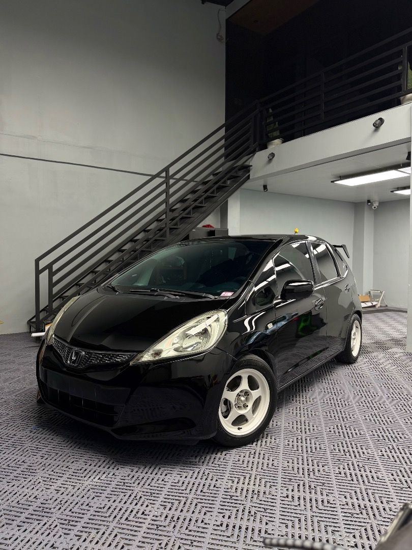 Honda Jazz 1.3 Hatchback (A) (Category: Used Cars) located in Caloocan City. Submitted by vishnu19m (Listing ID 1464977279, Image 1). Description: Well maintained. Very fuel efficient! For Sale‼️ 2013 Honda Jazz GE 1.3 Manual Transmission SEMI LOADED Newly Ceramic Coating Sept 2026 Newly change oil June 2026 92,xxx odo orig mileage unli scan Complete original papers With manual booklet 1st owner acq., open DOS LTO Registered til 2027 Ice Cold AC 