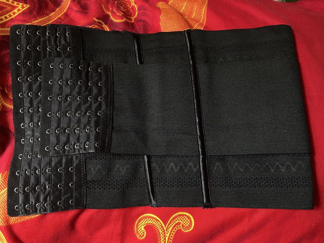 hottie diary waist trainer (m-l) (Category: Undergarments & Loungewear) located in Las Pinas. Submitted by picksbycie (Listing ID 1464987919, Image 1). Description: - Color: Solid black - Material: Breathable mesh pattern sections for comfort - Closure: Multiple rows of hook and eye for an adjustable fit - Support: Built-in boning for extra back support and body shaping - Compression: Wide elastic wrap belt in the center for targeted waist contro
