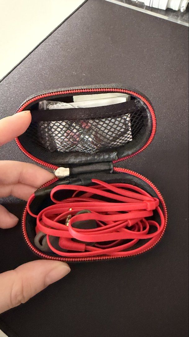 HyperX Cloud Earbuds (Category: Earphones) located in Kuala Lumpur. Submitted by teydoris (Listing ID 1465120686, Image 3). Description: - Brand: HyperX - Color: Red - Condition: 9.5/10 - Inline microphone for crystal-clear voice comms - Tangle-free flat cable design for hassle-free storage - 3.5mm angled plug for durable and comfortable connection - Includes a premium hard shell carrying case with zipper closure - Comes with extra silicone ear t