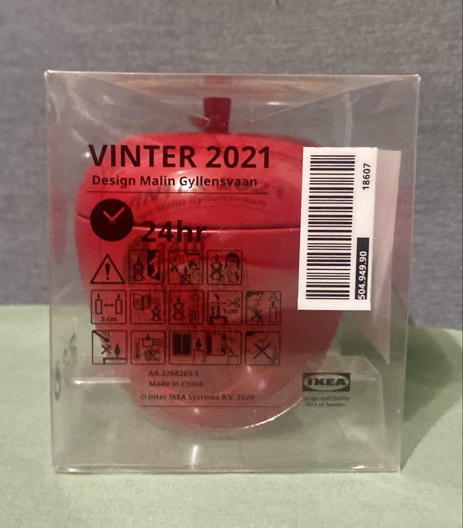 IKEA Apple-Shaped Scented Candle in Tin (Category: Home Fragrance) located in Pasig City. Submitted by nakamuraka (Listing ID 1464982435, Image 2). Description: - Brand: IKEA (Vinter 2021 Collection by Malin Gyllensvaan) - Design: Red apple-shaped metal tin container with lid - Fragrance: Apple, cinnamon, and vanilla - Burn time: 24 hours - Condition: Brand new, still sealed in original clear plastic display box - Ideal for holiday home decor or 