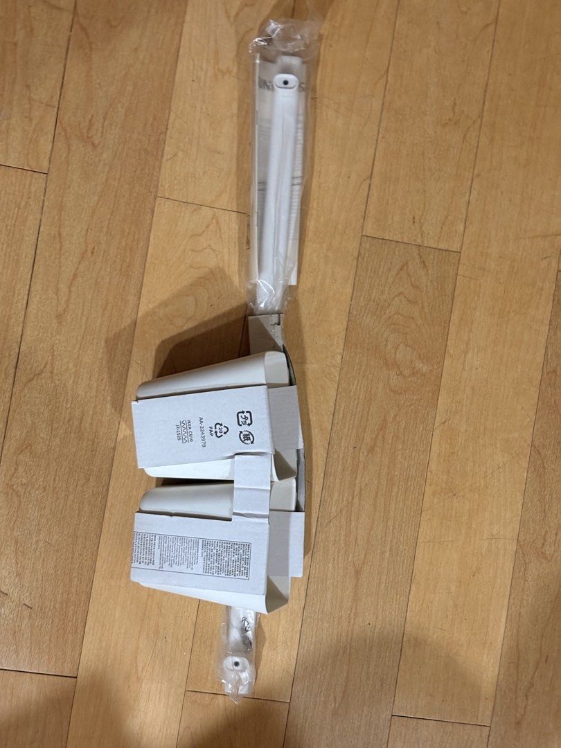 IKEA kitchen rail (Category: Pots & Planters) located in Manila. Submitted by mystitch888 (Listing ID 1464980935, Image 1). Description: - Brand: IKEA - Condition: Brand new, unopened in original packaging - Color: White - Material: Metal rod with hanging plant cups - Features: Easy wall or rail setup, includes original paper instructions.