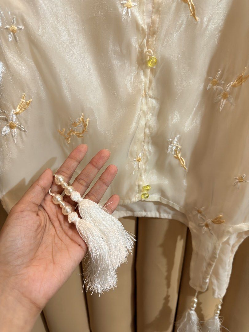 Improved Cheongsam Blouse (Category: Blouses) located in Manila. Submitted by glamstylemnl (Listing ID 1465145229, Image 3). Description: ♡ SIZE: XS ♡ BUST: 30 ♡ Swipe left to see the actual color & details ♡ chinese style / floral embroidered / front button closures / tassel at hem / missing 1 button ♡ HQ • 9/10 ♡ Ready to wear 👚.