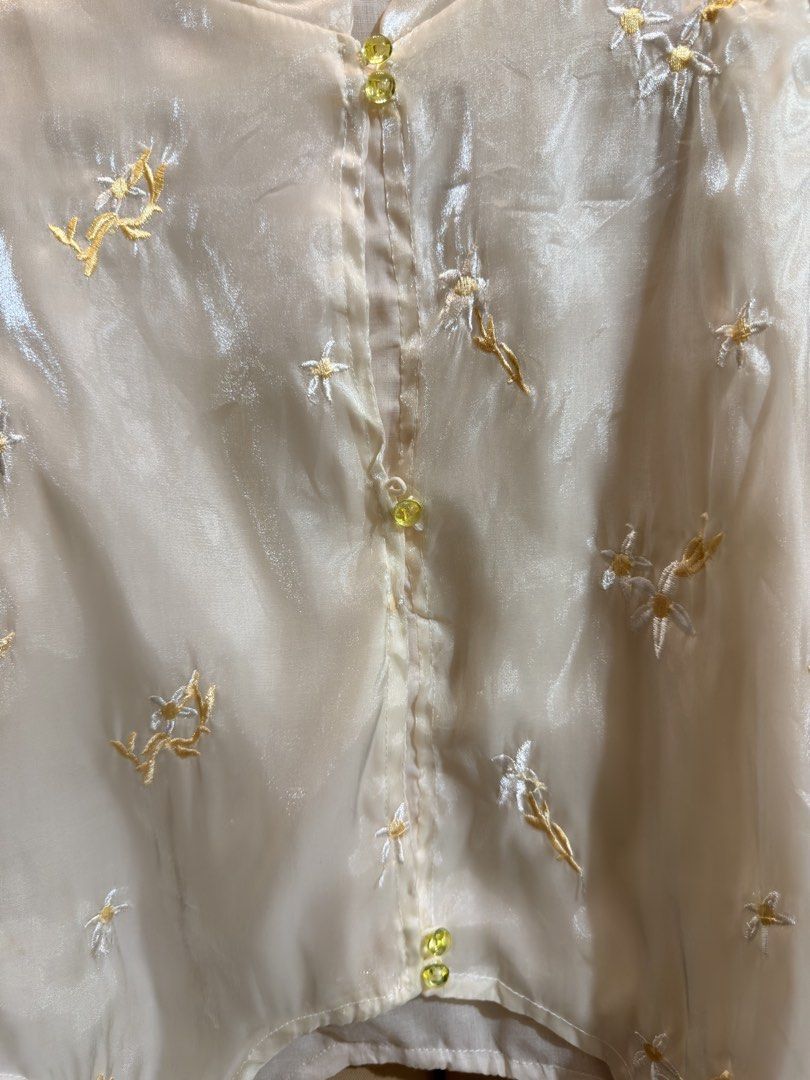 Improved Cheongsam Blouse (Category: Blouses) located in Manila. Submitted by glamstylemnl (Listing ID 1465145229, Image 2). Description: ♡ SIZE: XS ♡ BUST: 30 ♡ Swipe left to see the actual color & details ♡ chinese style / floral embroidered / front button closures / tassel at hem / missing 1 button ♡ HQ • 9/10 ♡ Ready to wear 👚.