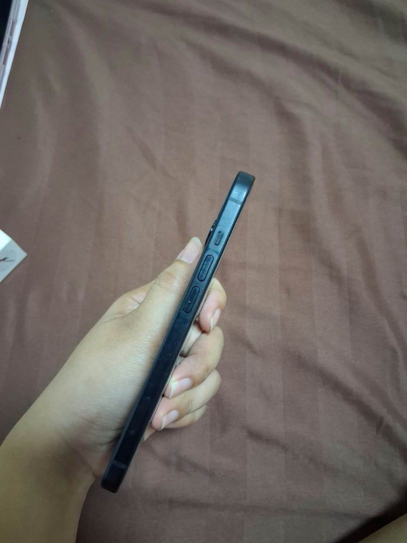 iPhone 15 Black 128gb (Category: iPhone 15 Series) located in Manila. Submitted by mmendoza1219 (Listing ID 1465022659, Image 2). Description: RFS: upgrading to a new phone NEGOTIABLE - 83% battery health - no SIM restriction (see actual photo) - Lady-owned - Personal phone - with original box and original charger cord - slightly negotiable - True Tone working - no history of repair - see actual issues regarding paint only - all working and in go