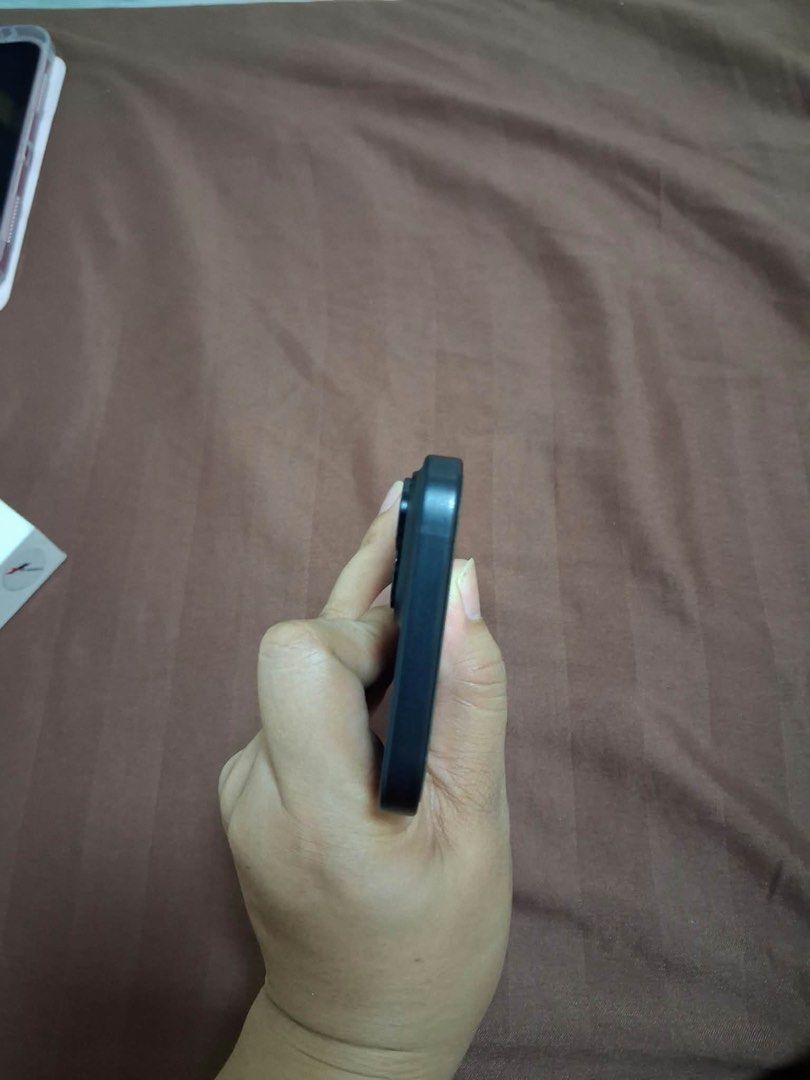 iPhone 15 Black 128gb (Category: iPhone 15 Series) located in Manila. Submitted by mmendoza1219 (Listing ID 1465022659, Image 3). Description: RFS: upgrading to a new phone NEGOTIABLE - 83% battery health - no SIM restriction (see actual photo) - Lady-owned - Personal phone - with original box and original charger cord - slightly negotiable - True Tone working - no history of repair - see actual issues regarding paint only - all working and in go