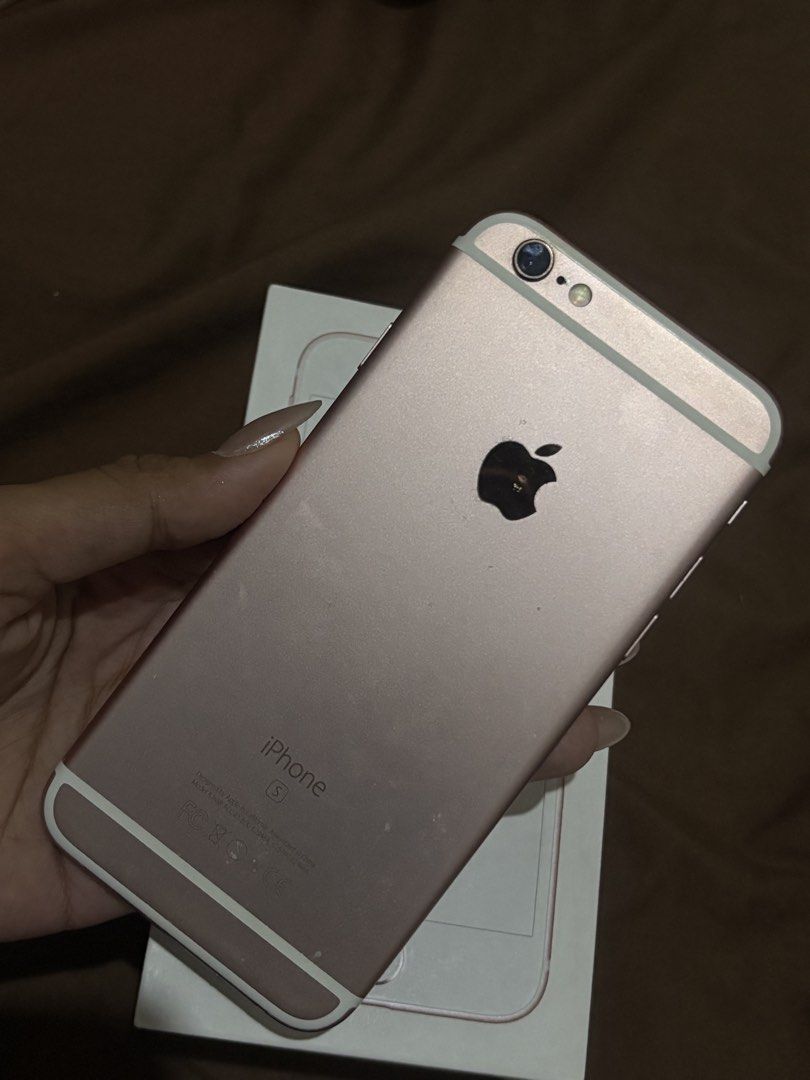 Iphone 6s (Category: iPhone 6 Series) located in Taguig. Submitted by piayhia (Listing ID 1465136957, Image 1). Description: iPhone 6s Rose Gold • 64GB storage • Rose Gold • Fully functional / no major issues • Touch ID working properly • Apple ID can be logged in • SIM card compatible • Battery Health: 69% • Original box included • Box has the same serial number as the phone • With signs of use from normal usage ✨ Everything is working properly 