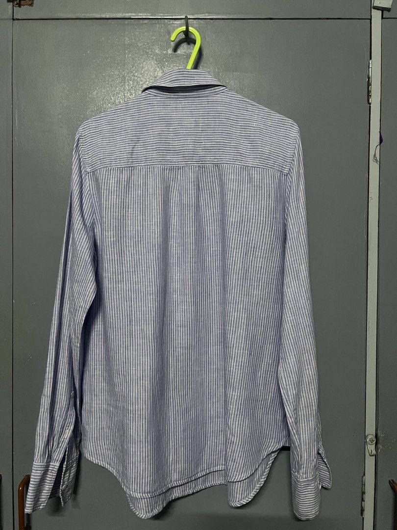 J Crew Blue/White Stripes Half Button Down (Category: Longsleeves) located in Makati City. Submitted by cctgsupplyxo (Listing ID 1465054684, Image 2). Description: Classic J.Crew blue and white striped button-down shirt in Size 6. Bust size 34 (oversized fit) 36 (loose fit) 38 (relaxed fit) Features long sleeves, a chest pocket, and a lightweight feel—perfect for casual wear or layering. Fabric: 100% linen.