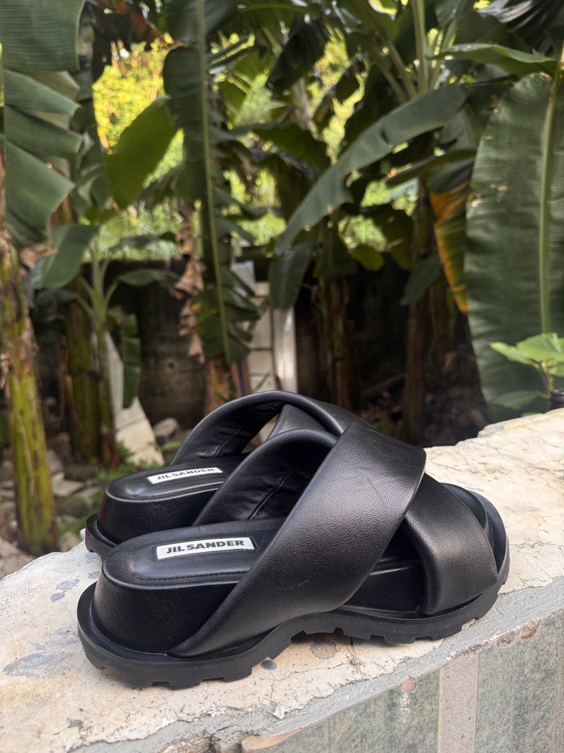 Jil Sander Cross- Strap Black Leather Sandals (Category: Flats & Sandals) located in Manila. Submitted by thevintage90_sretro. (Listing ID 1465041833, Image 2). Description: Jil Sander Cross- Strap Black Leather Sandals Made in Italy Size 7-8 wmns DM for inquiries.