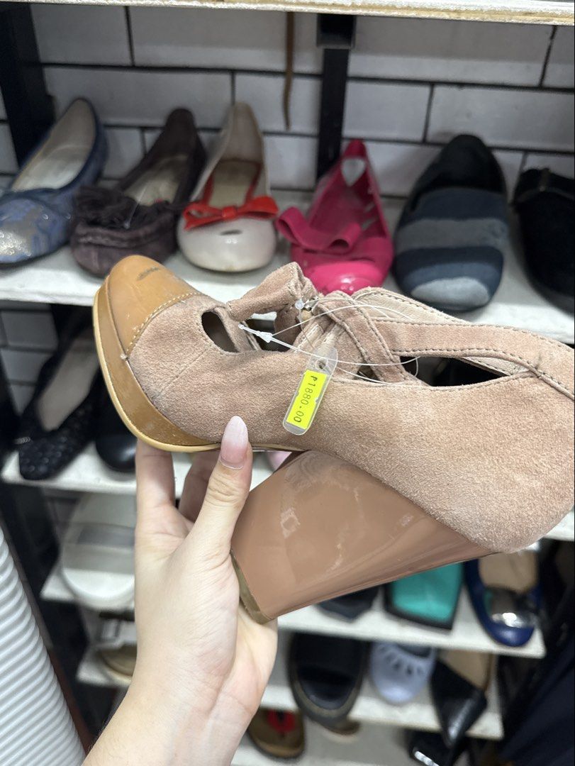 Jill Stuart Suede Wedge Heels with Bow (Category: Heels) located in Manila. Submitted by fastlion.584bdf (Listing ID 1465067191, Image 3). Description: - Brand: Jill Stuart - Material: Light pink suede with glossy patent leather cap toe and chunky heel - Design: Large bow detail on the back heel strap with an adjustable buckle closure - Comfort: Stable chunky heel and comfortable inner sole with visible brand stamp - Condition: Excellent pre-love