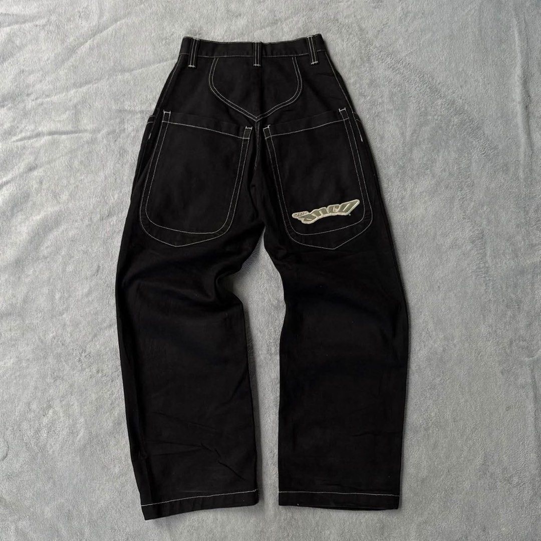 Jnco Jeans The Low Down (Category: Jeans) located in Manila. Submitted by bdimo9 (Listing ID 1465058184, Image 2). Description: DETAILS MEASUREMENTS TAGGED SIZE: —26 WAIST: —27 LEG OPENING: —10 TOTAL LENGTH: —42 • Signature contrast white stitching throughout • Large back patch pockets • Additional side utility/cargo pocket detailing • JNCO logo embroidery on back pocket • JNCO-branded metal waist button • Curved pocket stitching • Reinforced sti