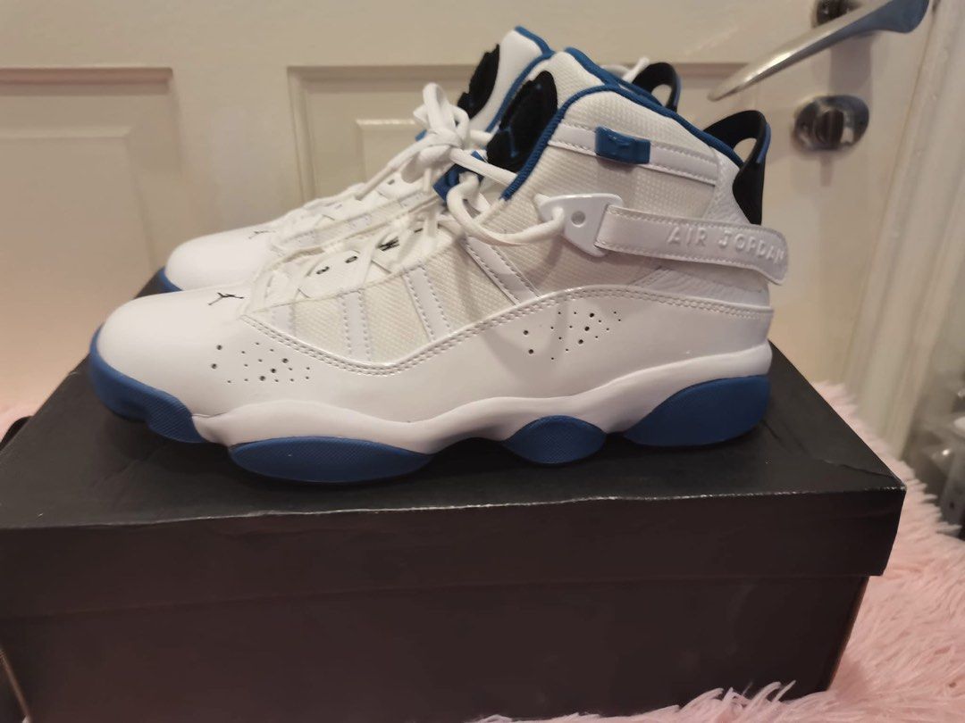 Jordan 6 Rings White Royal Blue (Category: Sneakers) located in Manila. Submitted by cleverstone_21f597 (Listing ID 1464976298, Image 1). Description: - Authentic Jordan 6 Rings sneakers in a striking white and royal blue colorway - High-top design featuring secure lace closure and adjustable ankle strap - Impeccable condition with clean uppers and outsoles, ready to wear straight out of the box - Includes the original black box for storage or gi