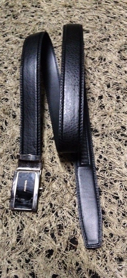 Jorengio Black Leather Ratchet Belt (Category: Belts) located in Paranaque City. Submitted by michael-08 (Listing ID 1465168559, Image 3). Description: - Brand: Jorengio - Material: Black leather with textured finish and contrast stitching - Buckle: Silver and black automatic ratchet buckle with vertical brand inscription - Fit: Track system on the back for easy micro-adjustments - Condition: Brand new / Excellent quality NO ISSUE GOOD CONDITION 