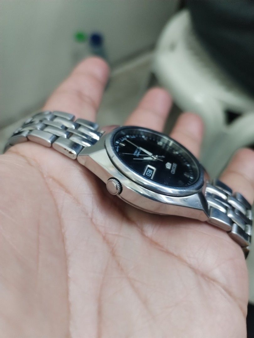 June 2012 Seiko 5 SNKL71J Men's Automatic (Category: Men's Watches) located in Pasig City. Submitted by BeatsandTicks (Listing ID 1465061938, Image 3). Description: June 2012 Seiko 5 SNKL71J Men's Automatic Reference Number: 7S26-01T0 Made in Japan Serial Number: 260570 Textured black dial 21 jewels Approximately 37 mm case size Luminous hands and hour indices Nearly mint condition Newly serviced Light signs of wear from normal use Unbuffed Selli