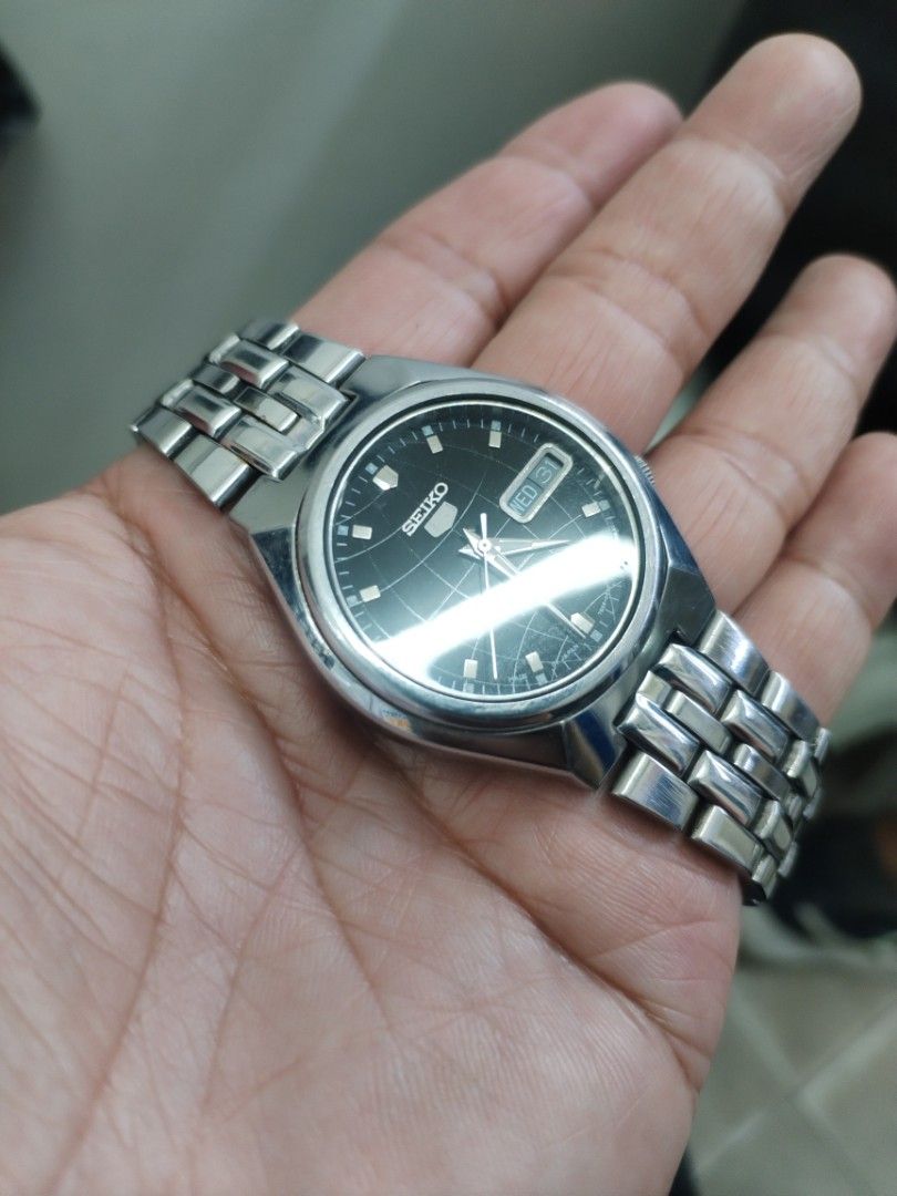 June 2012 Seiko 5 SNKL71J Men's Automatic (Category: Men's Watches) located in Pasig City. Submitted by BeatsandTicks (Listing ID 1465061938, Image 2). Description: June 2012 Seiko 5 SNKL71J Men's Automatic Reference Number: 7S26-01T0 Made in Japan Serial Number: 260570 Textured black dial 21 jewels Approximately 37 mm case size Luminous hands and hour indices Nearly mint condition Newly serviced Light signs of wear from normal use Unbuffed Selli