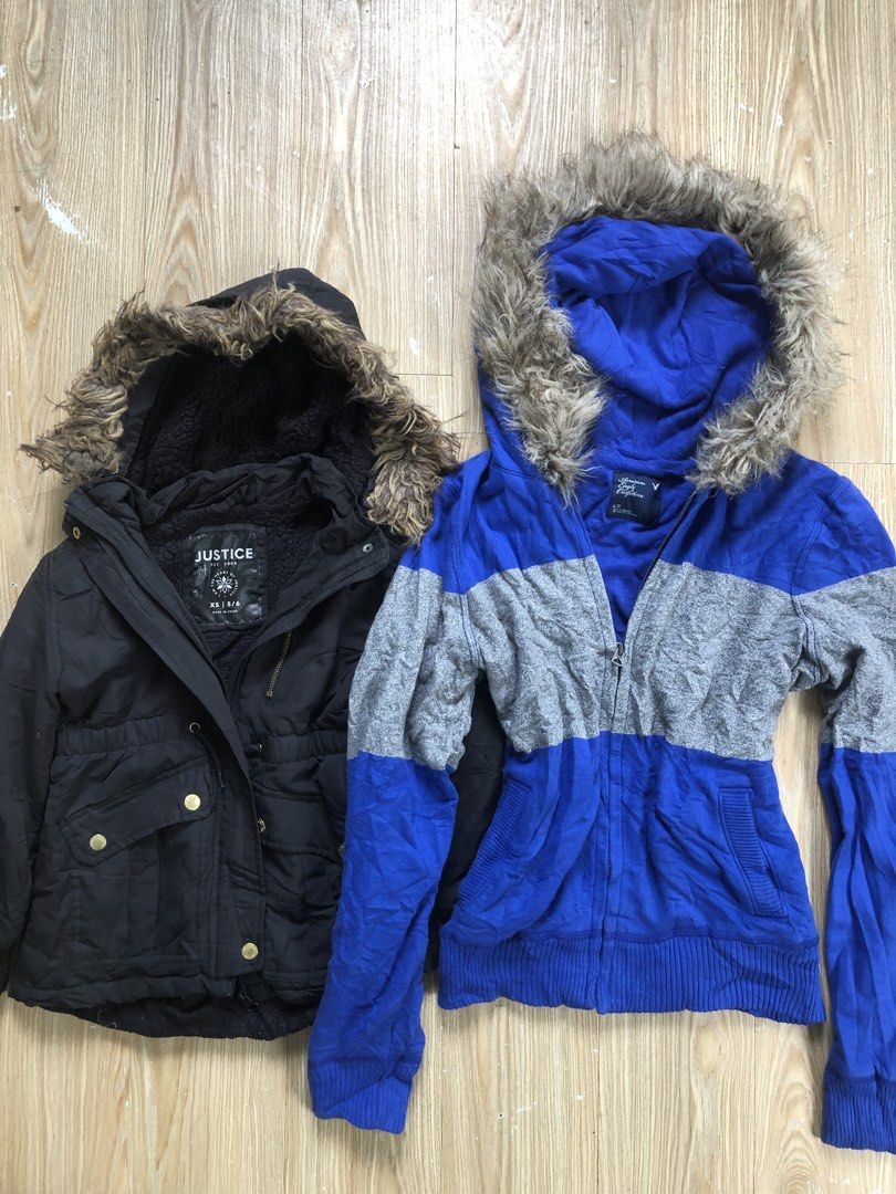 Justice and American Eagle Hooded Jackets Bundle (Category: Coats, Jackets and Outerwear) located in Manila. Submitted by tunicy2k (Listing ID 1465023007, Image 1). Description: - Bundle of 2 stylish and warm hooded jackets - Item 1: Justice Black Puffer Jacket, Size XS (5/6), features furry hood trim and button pockets - Item 2: American Eagle Outfitters Blue/Grey Colorblock Zip Hoodie, Size L, features furry hood trim and front pockets - Perfec