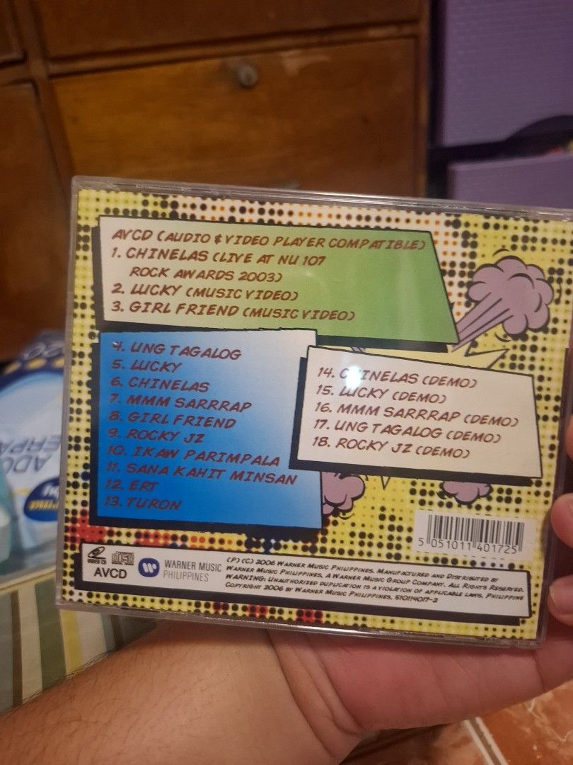 Kamikazee Special Edition Audio and Video CD (Category: CDs & DVDs) located in San Jose del Monte. Submitted by youweiner48495 (Listing ID 1465006664, Image 2). Description: - Artist & Title: Kamikazee Special Edition CD & AVCD - Art Style: Cool comic book pop art cover design - Tracklist Highlights: Includes OPM hits like Chinelas, Lucky, and Girl Friend - Bonus Features: Includes live performances and music videos - Condition: Disc surface is c