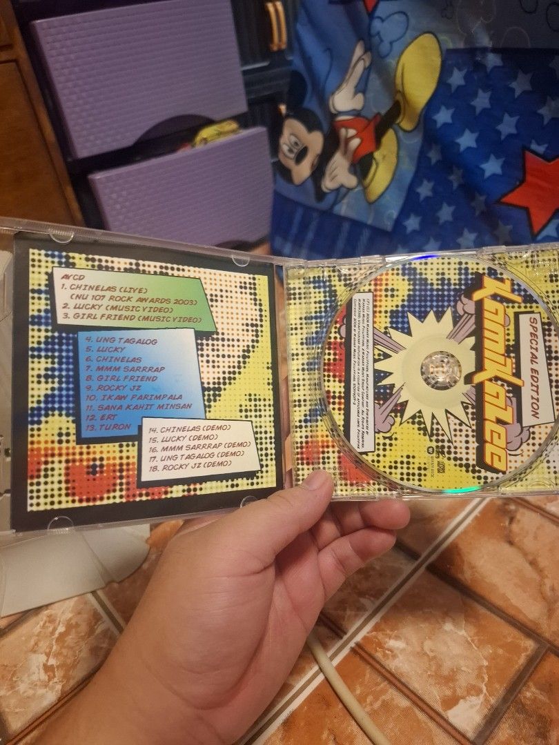 Kamikazee Special Edition Audio and Video CD (Category: CDs & DVDs) located in San Jose del Monte. Submitted by youweiner48495 (Listing ID 1465006664, Image 3). Description: - Artist & Title: Kamikazee Special Edition CD & AVCD - Art Style: Cool comic book pop art cover design - Tracklist Highlights: Includes OPM hits like Chinelas, Lucky, and Girl Friend - Bonus Features: Includes live performances and music videos - Condition: Disc surface is c