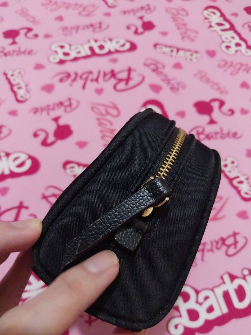 Kate Spade Dawn Small Dome Cosmetic Black (Category: Purses & Pouches) located in Manila. Submitted by PrinceDani.Clothing (Listing ID 1465050134, Image 3). Description: - Authentic Kate Spade cosmetic pouch in classic black - Durable and lightweight nylon material with a dome shape - Elegant gold-tone hardware and signature metal spade logo plaque - Premium leather zipper pull for easy opening - Immaculate interior and exterior with zero signs o