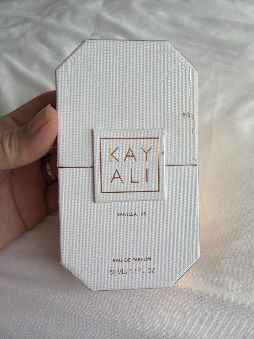 Kayali Vanilla 28 Eau De Parfum 50ml / authentic retails $175. (Category: Fragrance & Deodorants) located in Makati City. Submitted by cheapipie (Listing ID 1465026039, Image 1). Description: - Authentic Kayali Vanilla 28 Eau De Parfum (50ml bottle) or 1.7 FL oz retails for ₱11 k - Condition: sprayed for 8- times. - Includes original textured white and gold box - Fragrance profile: Warm and cozy scent with notes of vanilla orchid, tonka absolute,