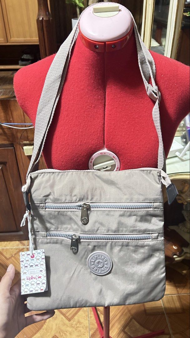 khaki kipling sling bag (Category: Cross-body Bags) located in Quezon City. Submitted by prelovedthings830 (Listing ID 1465049411, Image 1). Description: .