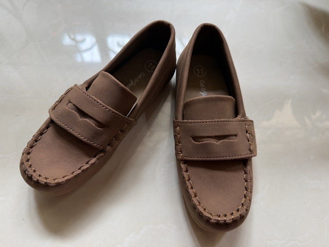 Kids Brown Loafers (Category: Babies & Kids Fashion) located in Paranaque City. Submitted by dbymbong (Listing ID 1465062621, Image 1). Description: - Size 11 (4-5 years old) - Brand: Cat & Jack - Color: Neutral tan-brown .