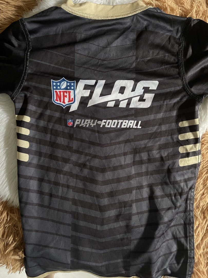 KIDS DRIFIT BUNDLE (Category: Shirts) located in Cainta. Submitted by zlove111 (Listing ID 1465168213, Image 3). Description: - Official New Orleans Saints NFL Flag youth jersey - Fully reversible design with black and gold options - Features team wordmark and iconic fleur-de-lis graphics on both sides - NFL Flag and Play Football branding printed across the back - Made with breathable athletic mesh fabric for comfort 6-8 yrs old.