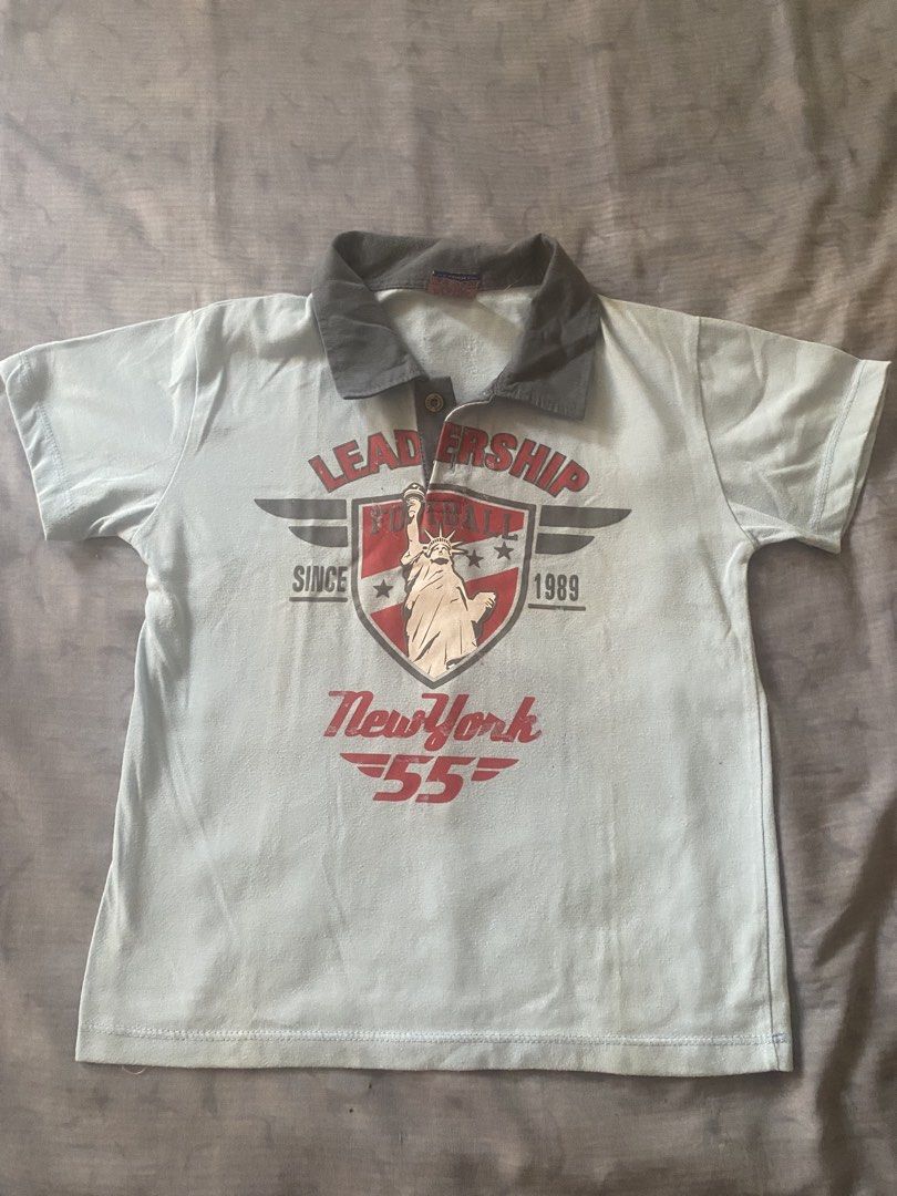 Kid’s Polo-Tee shirt (Category: Looking For) located in Paranaque City. Submitted by hershop.sbt (Listing ID 1465020953, Image 2). Description: Name: Kid’s Polo-Tee (Leadership Print) / Refined Heritage Kids’ Polo-Tee (Leadership Edition) Color: Light Blue with Charcoal Gray collar Size: Size 3 XL.