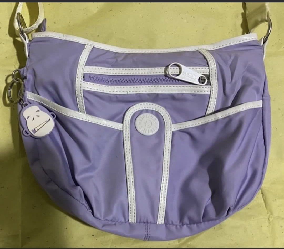 Kipling bag (Category: Cross-body Bags) located in Manila. Submitted by bwshoppe (Listing ID 1464983444, Image 3). Description: Kipling sling bag Brand new from the US. Size: approx 8”x10”.