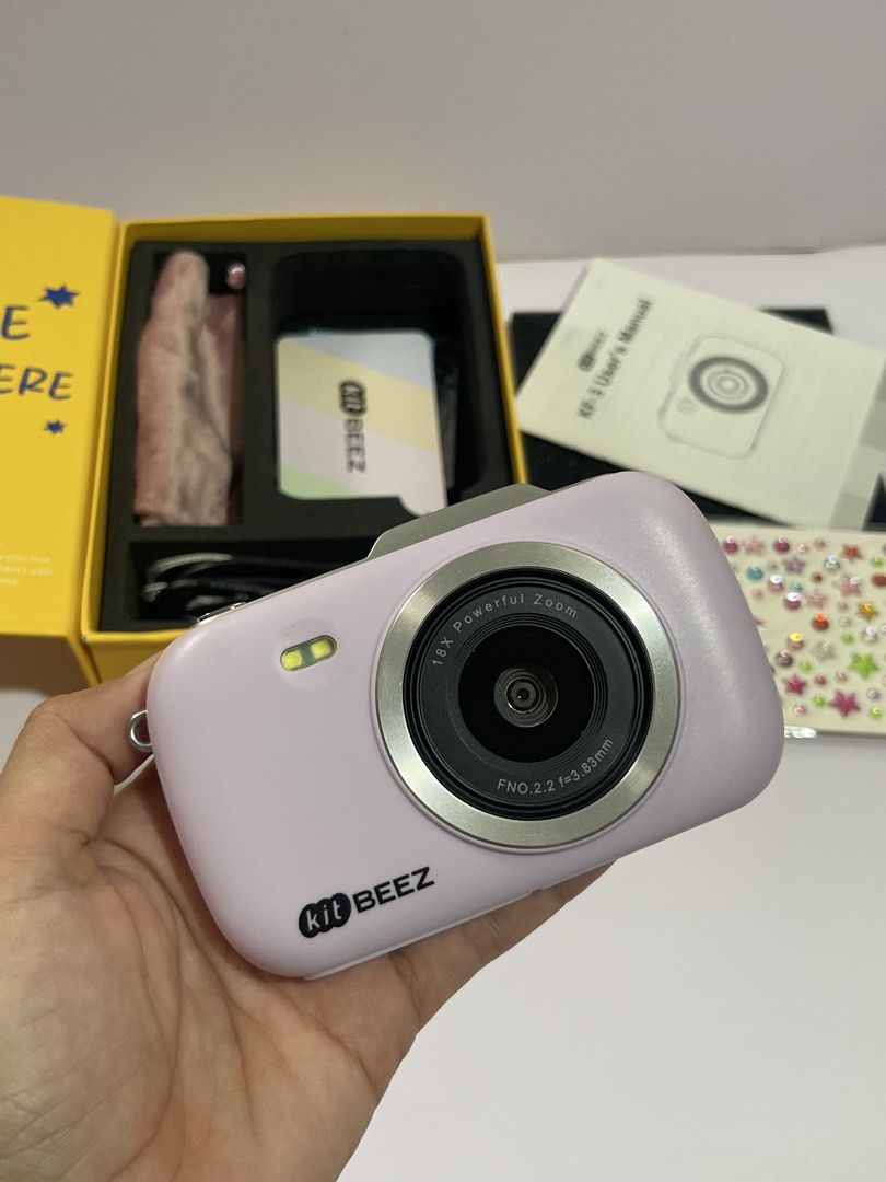 Kit Beez KF-3 Digital Camera Purple (Category: Cameras) located in Cavite. Submitted by moon_beam_22 (Listing ID 1465101687, Image 1). Description: - Model: Kit Beez KF-3 Compact Digital Camera - Color: Purple - Condition: Tested and fully working, including flash - Inclusions: Original yellow box, user manual, charging cable, pouch, memory card, and decorative sticker sheet - Ideal for: Everyday photography, casual snaps, or as a ready-to-gift i