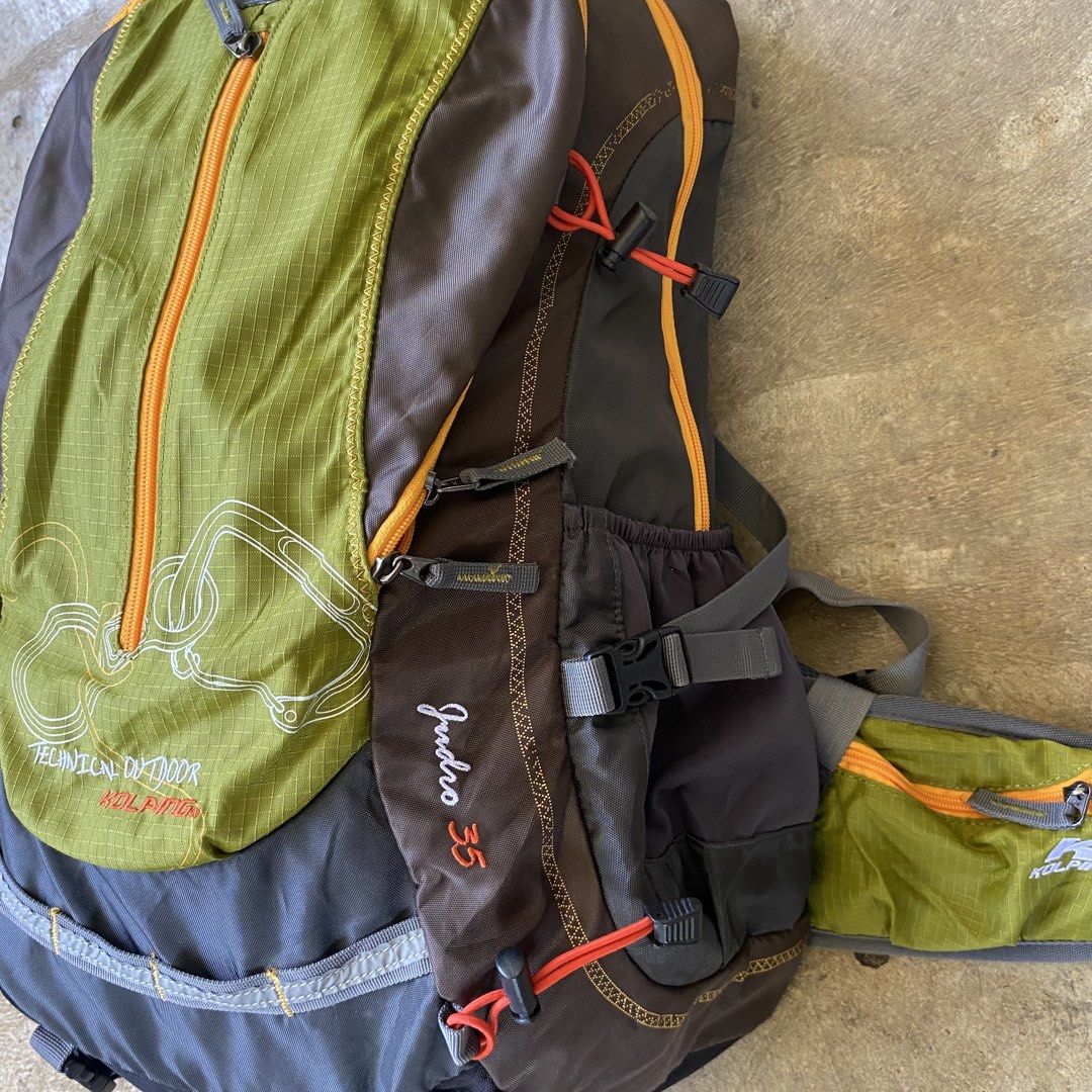 Kolping Indro 35 Technical Outdoor Backpack (Category: Backpacks) located in Sagbayan (Borja). Submitted by lunapawpaw46843 (Listing ID 1465049539, Image 2). Description: - Brand: Kolping Indro 35 Outdoor Backpack - Color: Green, Brown, and Grey - Features: Multiple zippered compartments, gear loops, side compression straps, and bungee cords for extra gear - Comfort: Padded shoulder straps, breathable mesh back panel, and a padded waist belt with