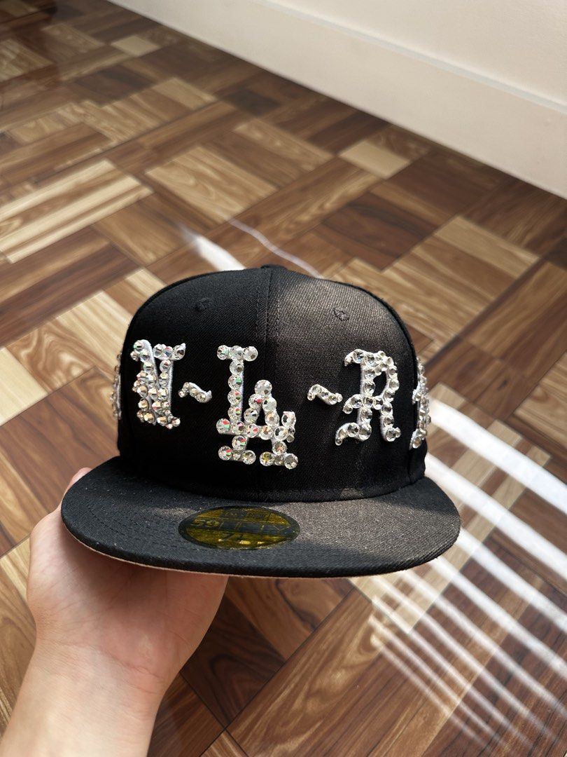 LA New Era Cap w RhineStone (Category: Caps & Hats) located in Manila. Submitted by aledobrian29085 (Listing ID 1465022544, Image 1). Description: Size 7 - 1/8 56.8cm Good Condition No issue .