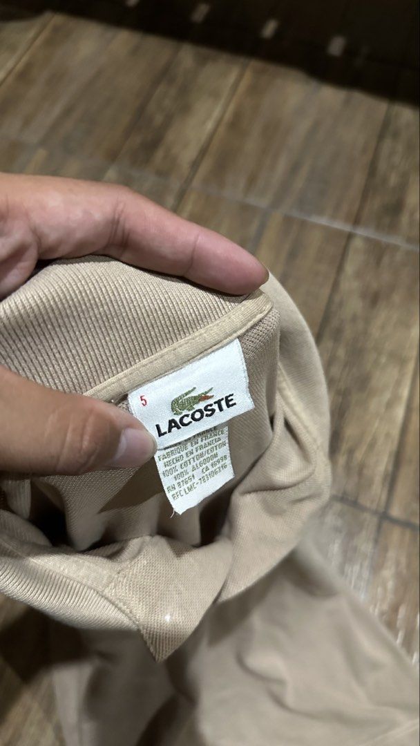 LACOSTE BROWN POLO (Category: Tshirts & Polo Shirts ) located in Manila. Submitted by urban.vintage (Listing ID 1464973313, Image 3). Description: ISSUE: CROPPED (NEED WASH) MOP :GCASH (NO COD) SHIP VIA: LALAMOVE & J&T LOCATION: PASIG CITY LENGTH: 26 WIDTH :23.