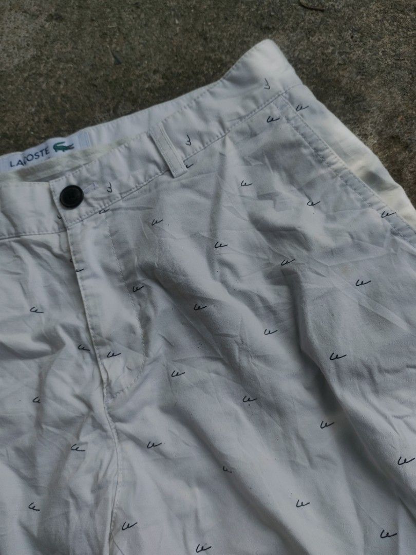 Lacoste Slim Fit Printed White Shorts (Category: Shorts) located in Quezon. Submitted by juldencebacolod (Listing ID 1465025580, Image 3). Description: ❗BAKA ✨ LACOSTE WALK SHORT ✨ ✅ WAIST: 30-31 ✅ LENGTH: 18.5 ✅ COLOR RATE: 9.5/10 ✅ EXCELLENT CONDITION ✅ ISSUE: NONE ❗PM LANG PO MGA BOSSING ❗.