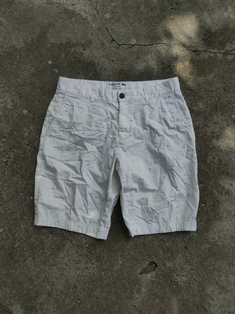 Lacoste Slim Fit Printed White Shorts (Category: Shorts) located in Quezon. Submitted by juldencebacolod (Listing ID 1465025580, Image 1). Description: ❗BAKA ✨ LACOSTE WALK SHORT ✨ ✅ WAIST: 30-31 ✅ LENGTH: 18.5 ✅ COLOR RATE: 9.5/10 ✅ EXCELLENT CONDITION ✅ ISSUE: NONE ❗PM LANG PO MGA BOSSING ❗.