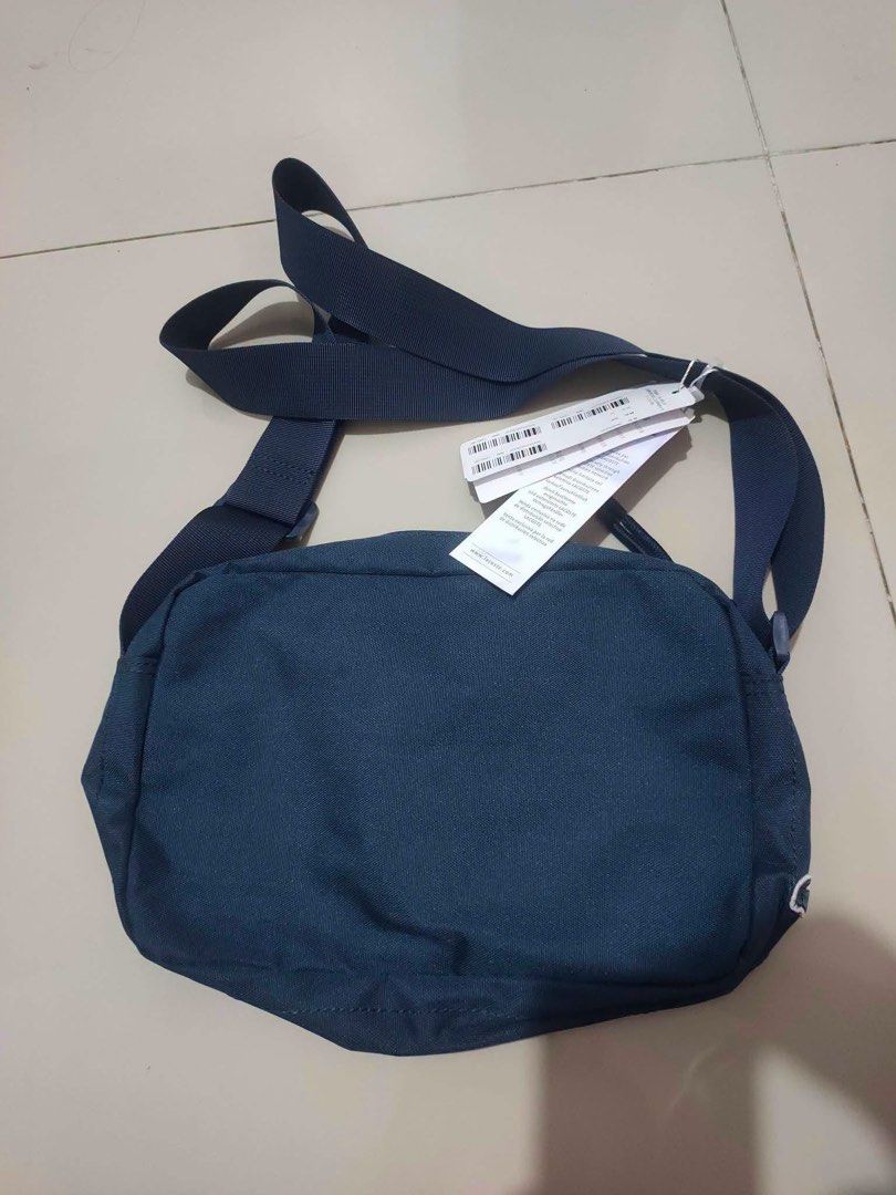 Lacoste sling bag w hang tag (Category: Luxury Bags & Wallets) located in General Trias. Submitted by luxfinds2019 (Listing ID 1464996884, Image 3). Description: Lacoste sling bag big logo 1700 Medium With hang tag No issue Loc laguna Pm .