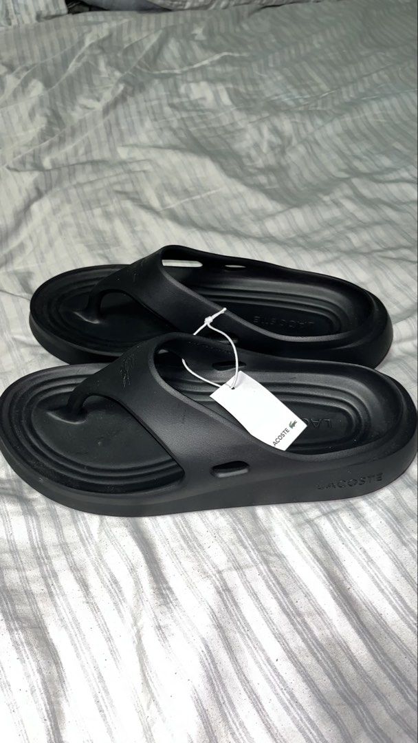 Lacoste Slippers (Category: Slippers & Slides) located in Baliuag. Submitted by daily_clozzy (Listing ID 1465126507, Image 1). Description: .