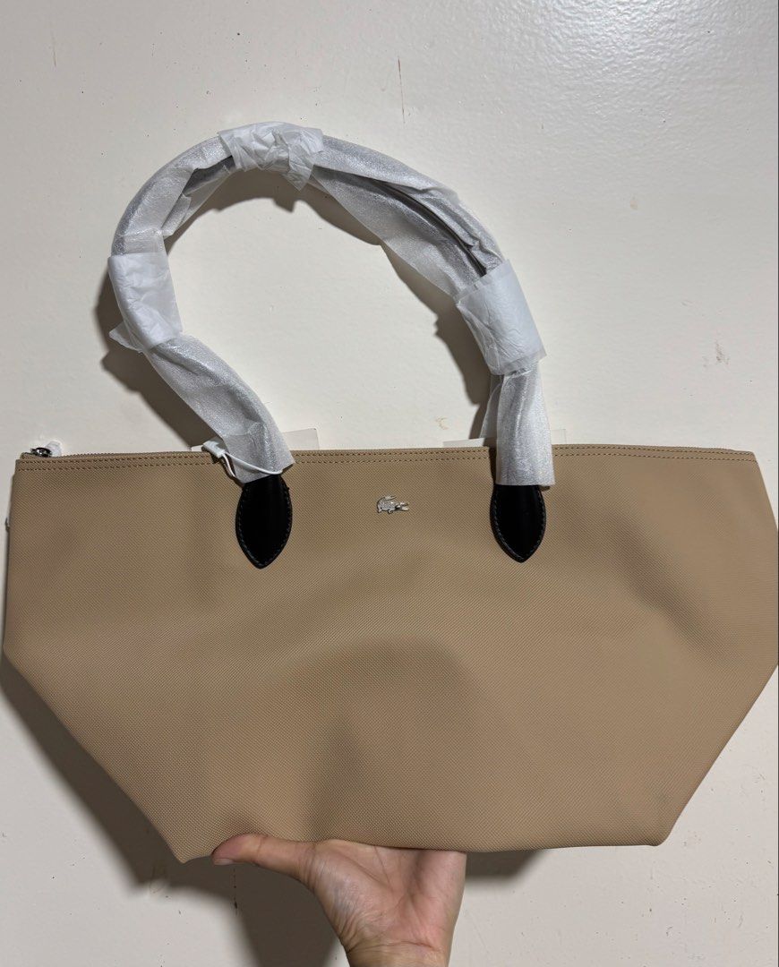 Lacoste Tote Bag (Category: Tote Bags) located in Legazpi City. Submitted by marthascollection19 (Listing ID 1464985086, Image 1). Description: Brandnew and Original.