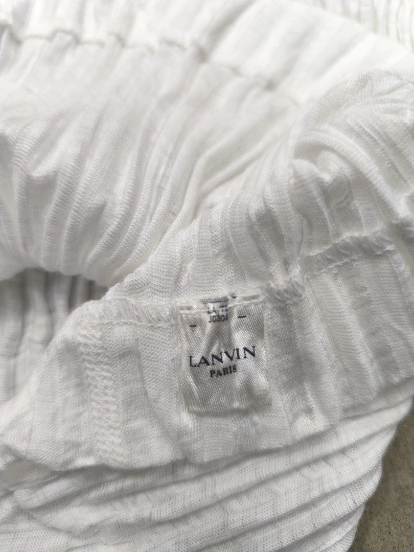 Lanvin Paris Vneck top (Category: Blouses) located in Naga. Submitted by mags61913 (Listing ID 1464969274, Image 2). Description: Lanvin Paris Vneck top fits small to medium stretchy 350+sf.