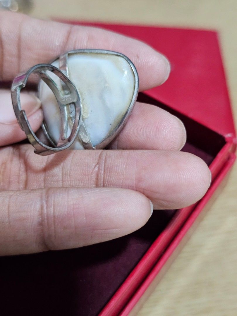 Large Pear-Shaped Mother of Pearl Statement Ring (Category: Rings) located in Caloocan City. Submitted by smart_shoppers_ville (Listing ID 1464994445, Image 3). Description: - Eye-catching statement ring with a large pear-shaped mother of pearl stone - Beautiful iridescent white and gold tones that shimmer in the light - Chunky metal setting for a bold, stylish look - Adjustable open band design easily fits multiple finger sizes - Versatile acces
