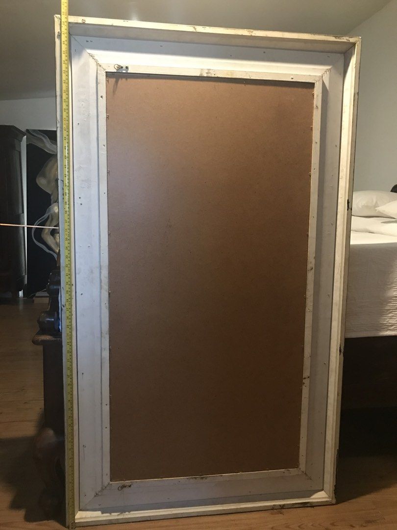Large Wooden Framed Wall Mirror (Category: Mirrors) located in Antipolo. Submitted by antipolocity (Listing ID 1465034528, Image 3). Description: - Dimensions: Approx. 100cm tall x 60cm wide - Style: Distressed grey finish with carved top arch and turned side posts - Versatility: Neutral look fits rustic, farmhouse, or traditional decor - Build: Sturdy wooden construction with metal corner braces on the back - Ready to hang: Comes with a heavy-du