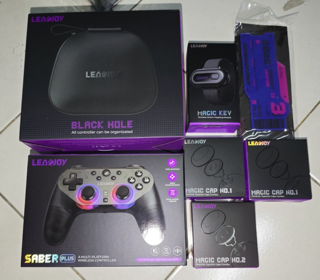 LEADJOY Saber Plus Multi-Platform Wireless Controller (Category: Controllers) located in Kuala Langat. Submitted by rezqiyusufcowarehouse (Listing ID 1465013301, Image 1). Description: Sealed Box *one bundle set + Magic Key Motion Mapping Module + Magic Cap No.1 x2box + Magic Cap No.2 1box + Storage Bag Organizer.