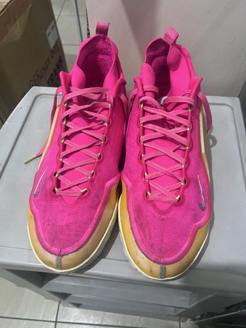 Lebron size 12 (Category: Sneakers) located in Quezon City. Submitted by albz45 (Listing ID 1465030338, Image 2). Description: - Brand: Nike - Colorway: Bright pink and yellow with metallic gold gradient - Details: Pink laces with green accents - Condition: Pre-loved with minor scuffs, dust marks, and tread wear from court use - Best for: Outdoor hoops or casual street style - Location: Ships from Philippines / Meetups available.