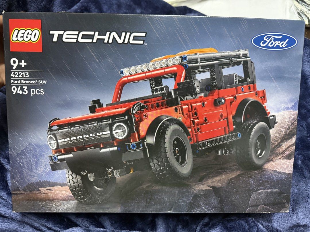 LEGO Technic 42213 Ford Bronco SUV (Category: Lego & Building Sets) located in Manila. Submitted by aybi.7.3.1 (Listing ID 1465058090, Image 1). Description: - Brand: LEGO Technic - Model: Ford Bronco SUV (Set 42213) - Piece Count: 943 pieces - Recommended Age: 9 years and up - Design: Detailed red off-road vehicle featuring a roll cage, roof lights, and large tires - Condition: 100% factory-sealed packaging, brand new.