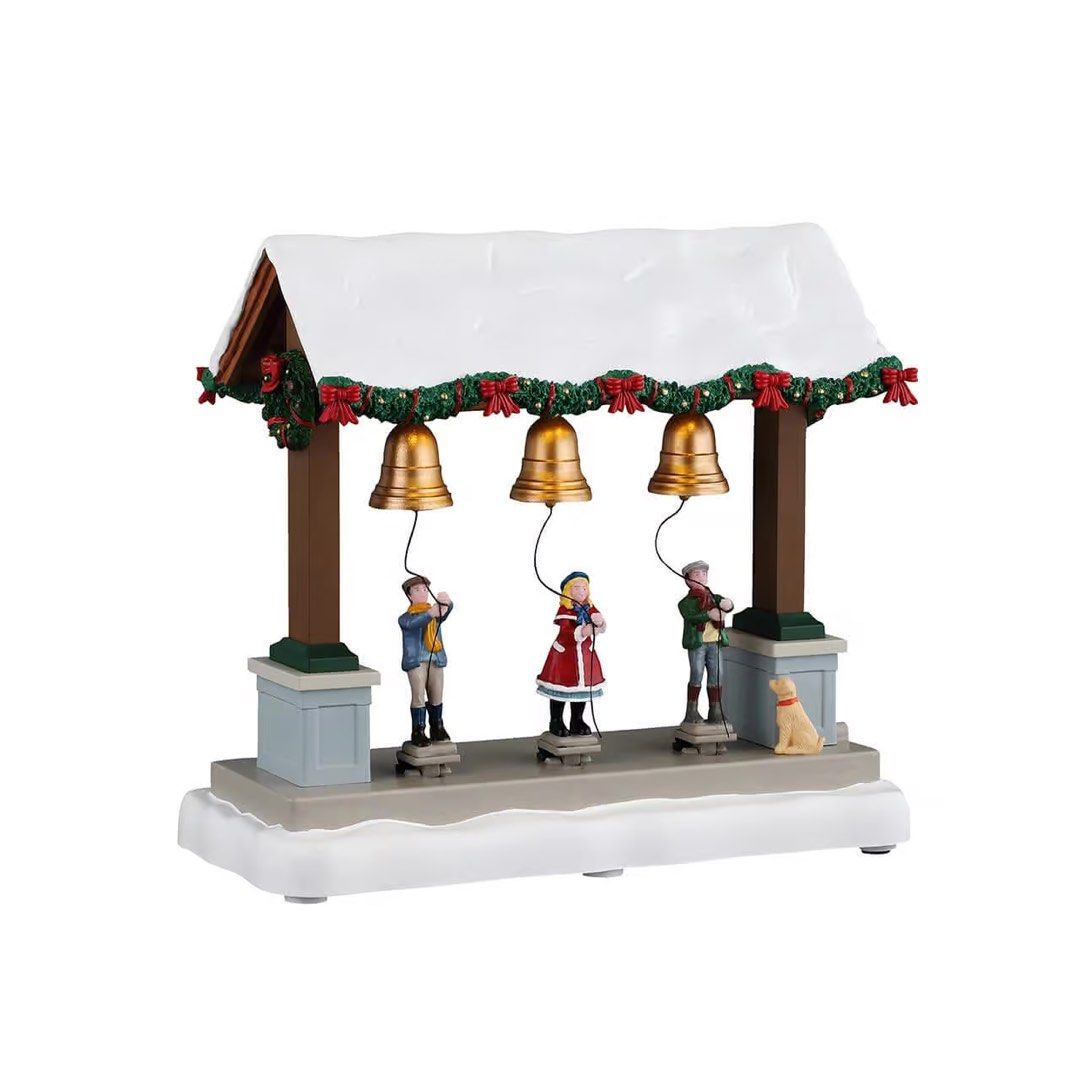 Lemax Bells Are Ringing animated (Category: Figurines & Statues) located in Santiago. Submitted by kitalpanga (Listing ID 1465058360, Image 1). Description: Animated. With sounds, light and movement - Festive holiday village miniature featuring three children ringing gold bells - Decorated with green garland, red bows, and a cute yellow dog - Detailed painted resin construction on a snowy base - Perfect addition to Christmas mantel displays and h